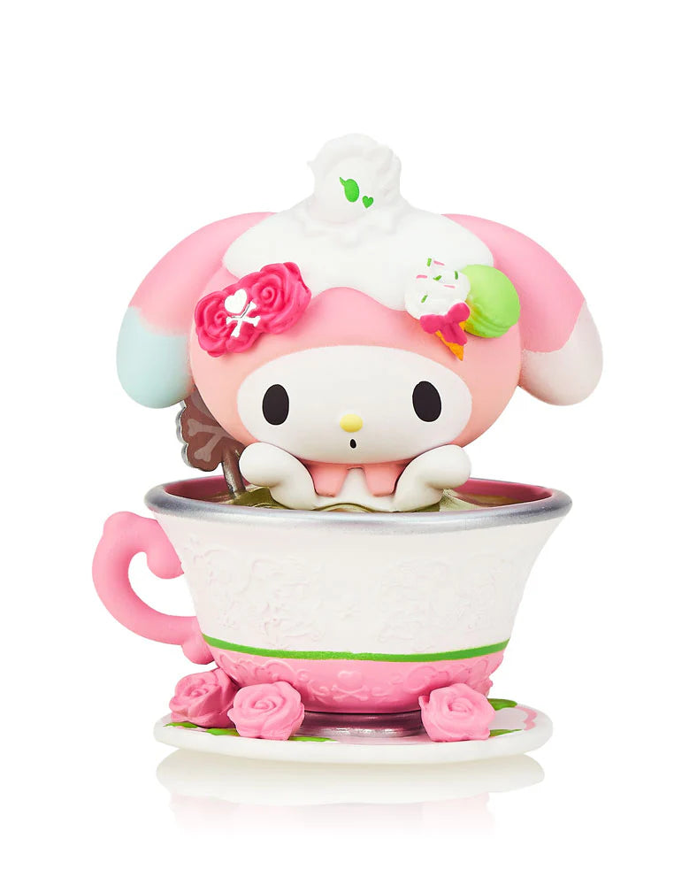 tokidoki x Kuromi & My Melody Garden Party Blind Box featuring a toy animal in a tea cup, highlighting whimsical garden tea party elements.