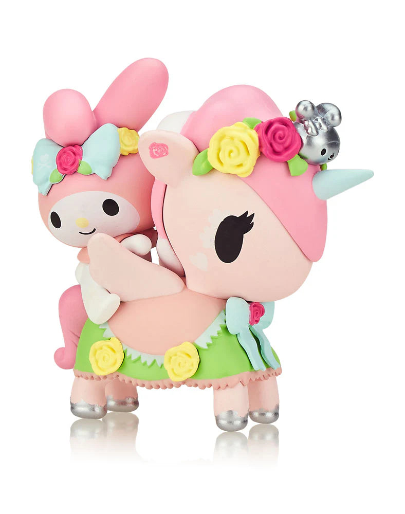 tokidoki x Kuromi & My Melody Garden Party Blind Box featuring a pink and white toy animal in a garden party theme.