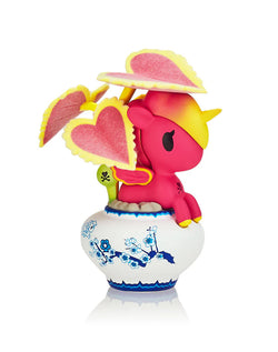 A Botanical Unicorno Blind Box Series toy, featuring a pink toy unicorn in a pot, part of Strangecat Toys' blind box and art toy collection.