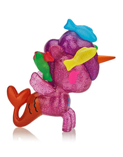 A toy unicorn with a fish on its head, part of the Botanical Unicorno Blind Box Series by tokidoki at Strangecat Toys. Features plant-themed hybrids like Aloe Vera and Fuchsia.