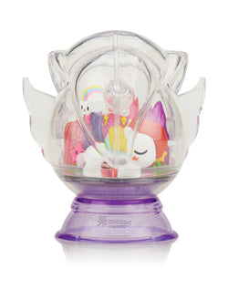 Dreaming Unicorno Blind Box featuring a clear dome with a removable toy Unicorno inside from Strangecat Toys.