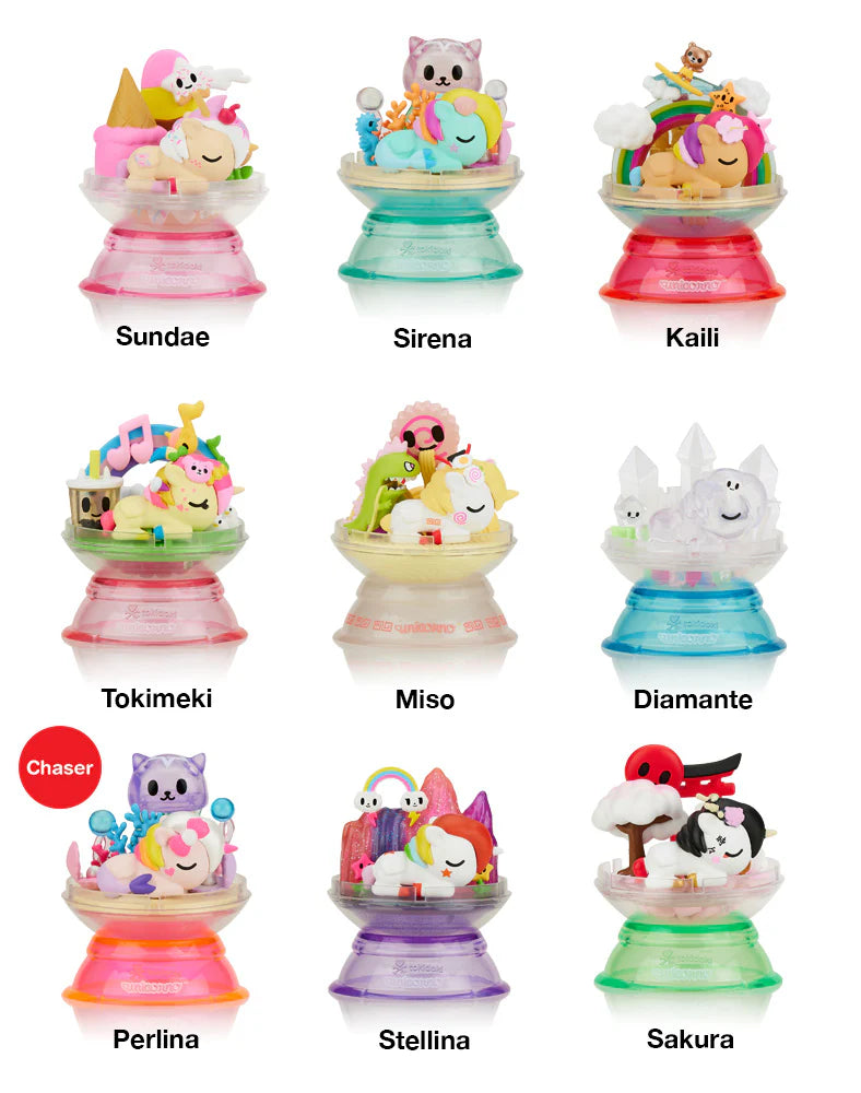 Dreaming Unicorno Blind Box features nine toy unicorns in a container, each in a removable dome, ready for display or play.