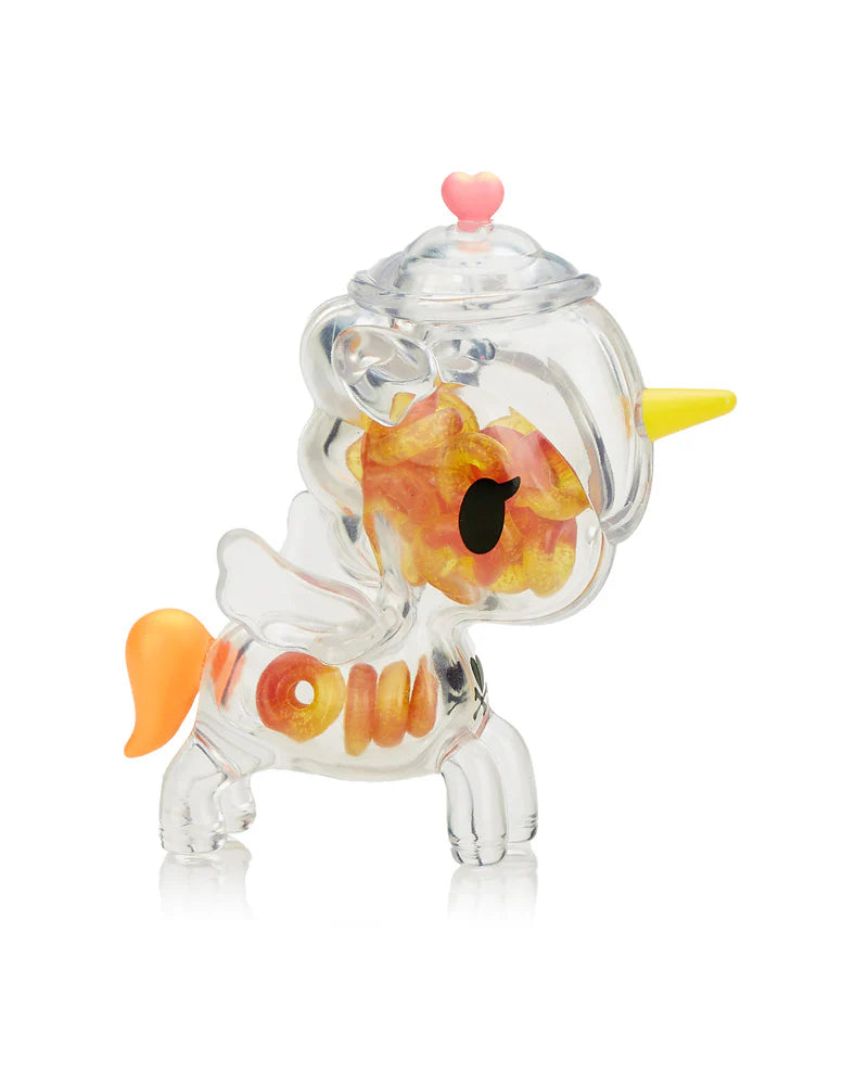 Sugar Shop Unicorno Blind Box featuring a transparent unicorn toy with candy-shaped pieces inside, part of Strangecat Toys' collectible art toy range.