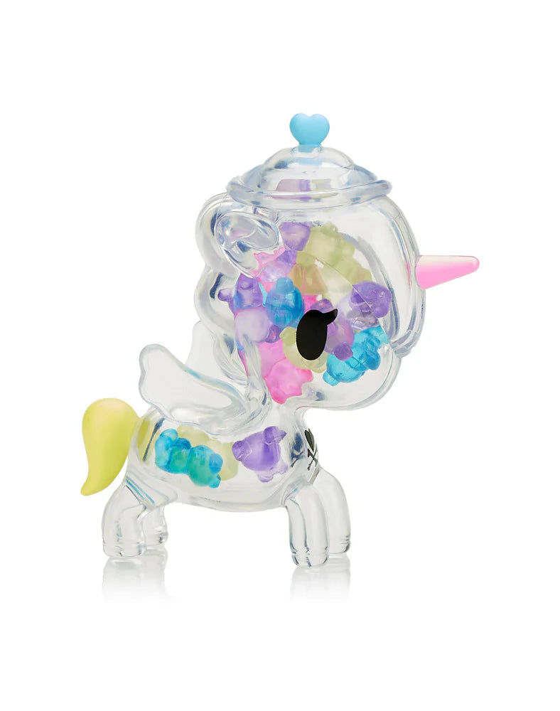 Sugar Shop Unicorno Blind Box featuring a transparent toy with colorful candy-shaped pieces inside, representing collectible art from Strangecat Toys.