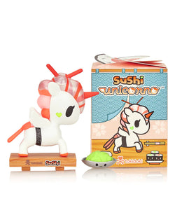 A toy unicorn with sushi-themed accessories in a blind box.