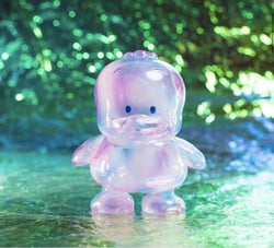 A close-up of AHIRUNOPEKKLE (Crystal version) toy on a surface, a toy from SANRIO PROJECT, 12cm soft vinyl design.