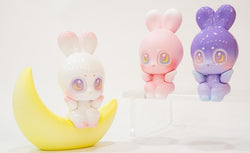 A Wish Rabbit art toy sitting, gazing lovingly, resin-made, 3.5. Cute Wish Rabbit Friends, blind box and art toy store product by Wish Land.