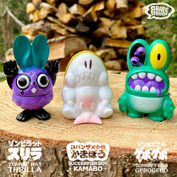 Sofubi toys: THRILLA, KAMABO, GEBOGEBO by Grape Brain - group of small animal figures on a wood surface.