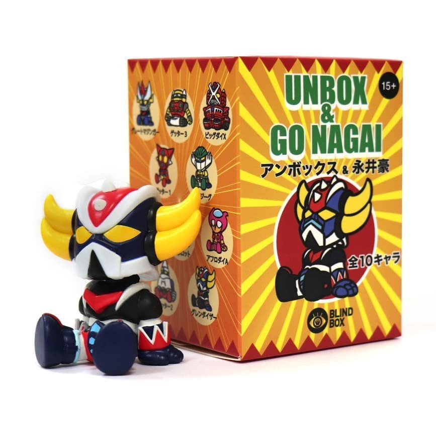 Toy figurine and box from GO NAGAI X UNBOX Blindbox Series. LEGO animated cartoon characters in sitting pose.