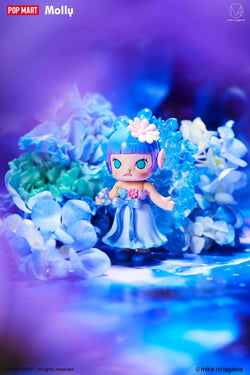 A toy doll and flower close-ups from Molly× Mika Ninagawa Flower Dreaming Blind Box Series.