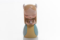 Toy figurine of a girl holding a pearl, created by Steven Jia. Part of White Night Fairy- Pearl Princess -Lite- Song of the Sea collection.