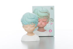 A miniature figurine of a boy with blue hair from Wind Rises - Relax by Keme life.