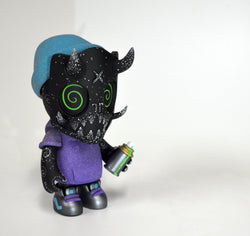 A toy figurine with a black mask, blue hat, and a spray can, part of the Goblin Squad - Demon Nugg by Nugglife collection.