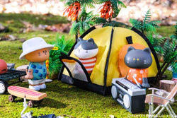 Toy cats in fashionable outfits on grass, including a skateboard and a tent, from Good Day Neko San Blind Box Series 1 by Fluffy House.