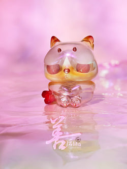 Hou Mia by Shabon Lee vinyl toy, limited edition of 60pcs: glass animal figurine, heart-shaped object, close-up details.