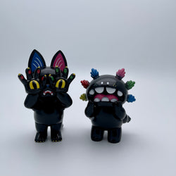 Two animal figurines and a toy close-up, part of ONIGIRI & MACCARONI - Candy In The Dark by Grape Brain - Strangecat Exclusive.