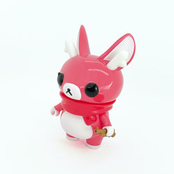 A pink toy animal with scarf, a whimsical character by Asako Hashi, part of a blind box and art toy store.