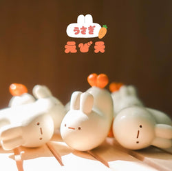 Fried Shrimp - Rabbit Edition by Crazy Eyes: Group of ceramic rabbits, bunny object, carrot, and more.