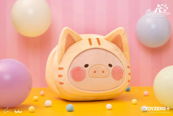 A stuffed animal in a cat garment, LuLu the Piggy Celebration - Kitty Hand Warmer Cushion.