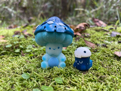 Toy figurines on grass with removable mushroom cap for nap times, limited edition ShumiKumbaa - Twilight by Mumbot x Bakumbaa.