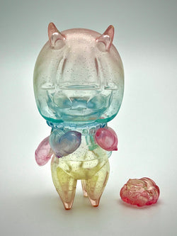 Japanese Sofubi toy piggy bank with horns, face, and hands, limited edition Chirasu-chan Rainbow Glass by PECHI X Art Junkie.