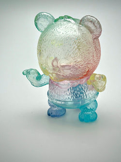 Toy bear with outstretched arms, part of Baby kumara Rainbow Glass collection by MoMoo Kuma X Art Junkie.