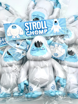 Stroll Chomp toy collaboration: plastic bag with toys, furry monster cartoon, blue monster cartoon, candy close-up, blue sign, logo close-up.