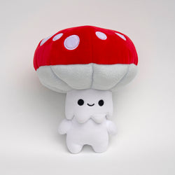 Shumi Mushrumi plush toy, a cute mushroom with a face, perfect for snuggles and forest adventures.