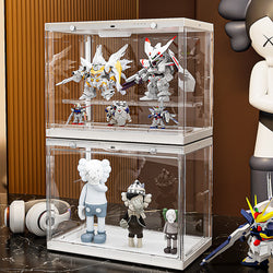 Toy Display Case Large with a group of toys, cartoon characters, and toy robots in a case, standing, and holding a gun.