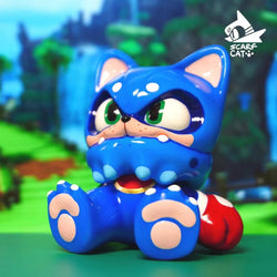 Resin figurine of SUPERSONIC SCARFCAT by CAR, a blue toy animal with green eyes, in a playful pose.