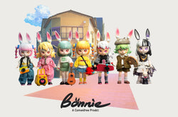 A group of dolls with bunny ears, a yellow bunny object with a heart, a toy animal with green hair, and more from Bonnie BJD Blind Box Series.