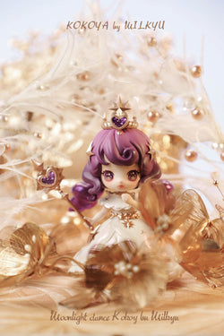 KOKOYA'S Wardrobe Story Blind Box Series figurine of a girl with crown, close-up of face and eye, doll and heart-shaped object.