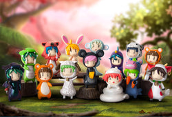 A group of small figurines from Heppoko Chinese Zodiac Blind Box Series, including a stuffed animal in a garment and toy figurines of a girl and cartoon characters.