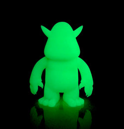 Stroll DIY GID Green Vinyl toy with hands up and glowing animal figures.