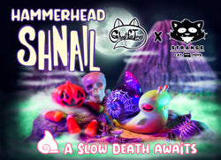 Hammerhead Shnail Spoopy Halloween toy by Ghost Fox Toys, with a logo, pumpkin, cat cartoon, and skull.